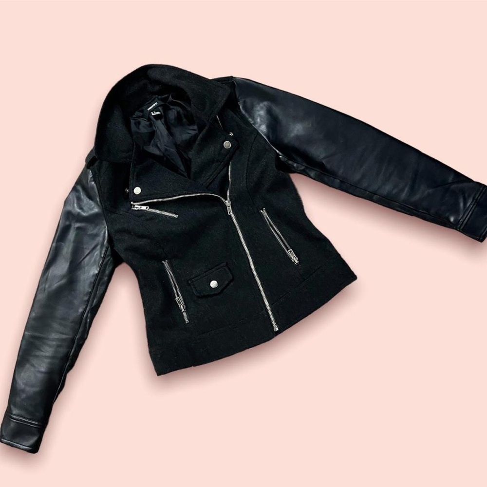 Faux Leather jacket with a wool type middle